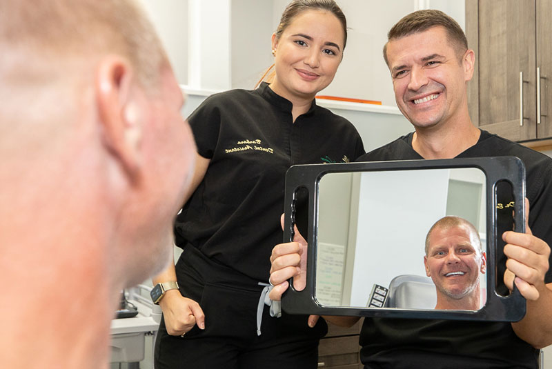 patient smiling after their dental procedure