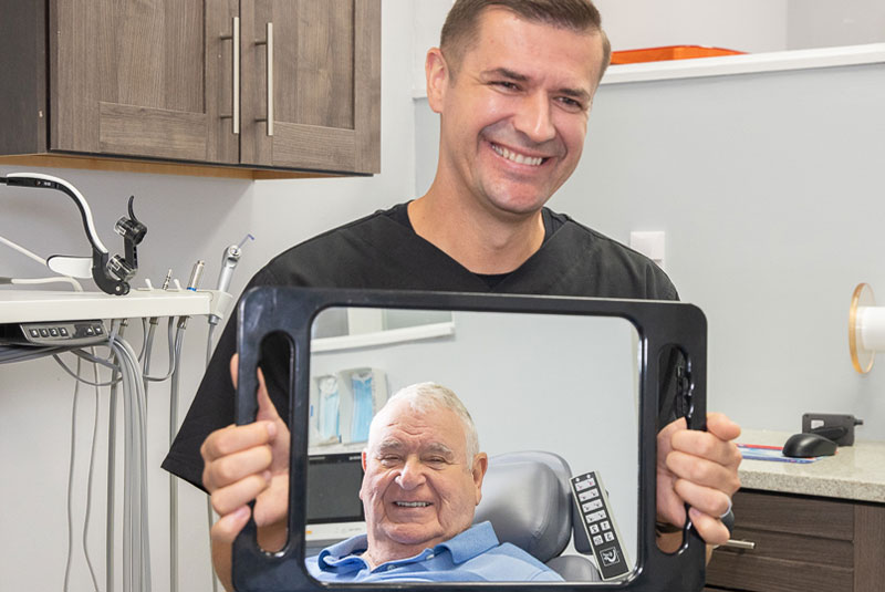 patient smiling confidently after their dental procedure